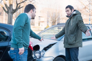 Drivers arguing whose to blame in the car accident.