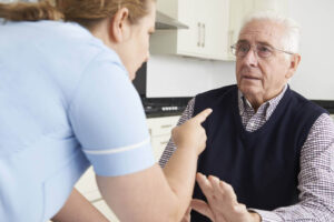 Male senior terrified by the nursing home staff.