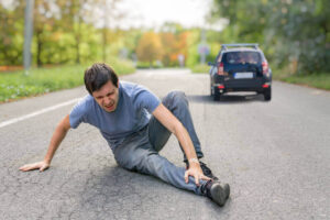 Man suffering injury from hit and run.